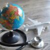 selective-focus-image-of-globe-toy-plane-and-stet-2025-03-15-11-51-24-utc